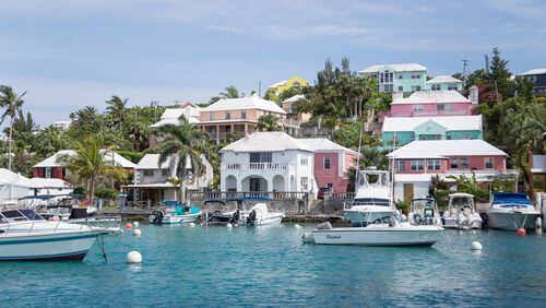 Bermuda’s Flatts Inlet, where luminous turquoise waters lap shell-pink sand beaches; frangipani perfumes the air, and pastel colored houses snuggle behind winding hedgerow-bordered roads. (Bermuda Tourism Authority/TNS)