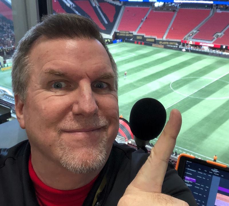 Steve Craig at the mic at Mercedes-Benz Stadium before an Atlanta United game. CREDIT: Contributed