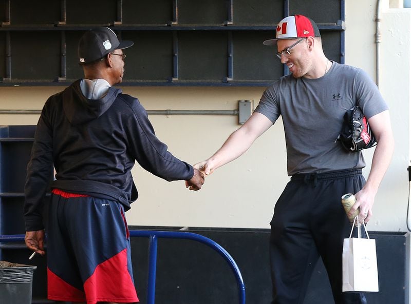  Freddie Freeman reported to spring training and ran into new third-base coach and infield instructor Ron Washington, who is on the field by 7:15 a.m. each day to put infielders through early work. (Curtis Compton/AJC)