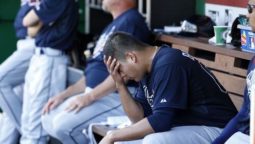 Manny Banuelos gave up seven runs (six earned) and recorded only six outs Sunday in the Braves' 12th consecutive loss. His expression after leaving the game captured the essence of the Braves' crumbling season. (AP photo)