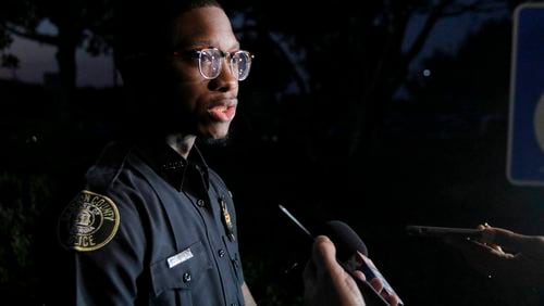 Clayton County police spokesman Jordan Parrish speaks during a news conference following a shooting on Peacock Boulevard near Morrow.
