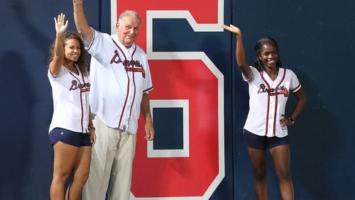 Former Braves Hall of Fame manager Bobby Cox tears down the number ‘6’, his old uniform number, counting down games left to play at Turner Field. Old No. 3 Dale Murphy took down the number Friday. Who will be the final two? (Curtis Compton /ccompton@ajc.com)