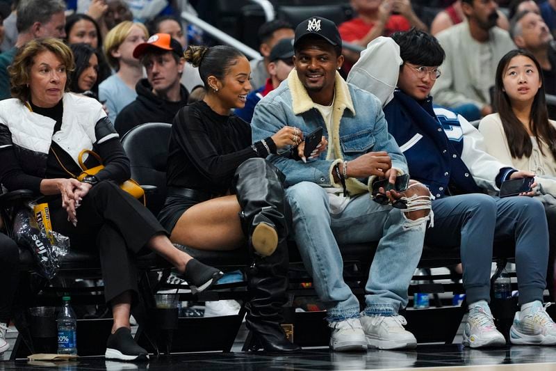 Cleveland Browns quarterback Deshaun Watson watches during the first half of an NBA basketball game between the Los Angeles Clippers and the Cleveland Cavaliers, Sunday, April 7, 2024, in Los Angeles. (AP Photo/Ryan Sun)