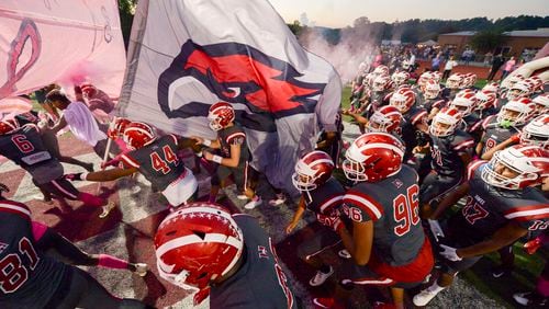 The Hillgrove Harks take the field during their home game against the McEachern Indians Friday, October 5, 2018 at Hillgrove High School. PHOTO/Daniel Varnado