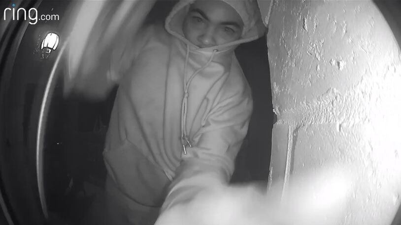 Surveillance video from a Ring camera captured this person taking the device off a home.