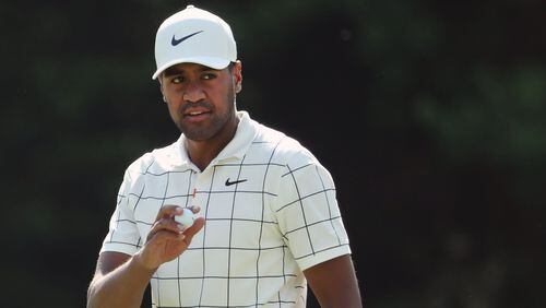 Tony Finau reacts to his birdie putt on 15 during the third round of the Masters Tournament Saturday, April 13, 2019, at Augusta National Golf Club in Augusta. Jason Getz / Special to the AJC