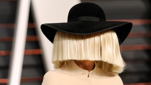 Sia arrives at the 2015 Vanity Fair Oscar Party in Beverly Hills, Calif. The singer tweeted a nude photo of herself on Nov. 6, 2017, after learning that someone was trying to sell nude paparazzi photos of her.