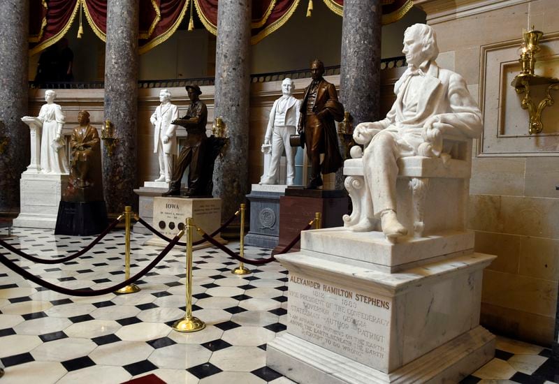 FILE - In this June 24, 2015 file photo, a statue of Alexander Hamilton Stephens, the Confederate vice president throughout the American Civil War, is on display in Statuary Hall on Capitol Hill in Washington. House Minority Leader Nancy Pelosi of Calif is calling for the removal of Confederate statues from the U.S. Capitol as the contentious debate over the appropriateness of such memorials moves to the halls of Congress. (AP Photo/Susan Walsh, File)
