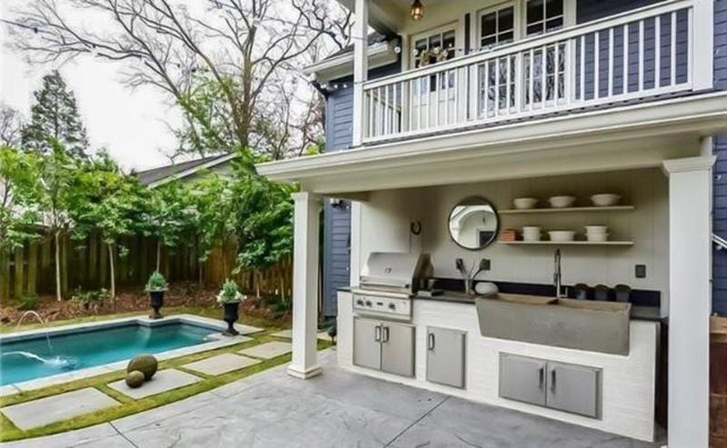 The outdoor kitchen and heated pool make this area perfect for entertaining or just relaxing.