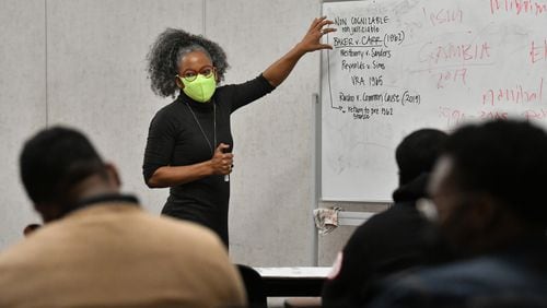 Adrienne Jones, an assistant political science professor, teaches concepts that embrace the ideas of critical race theory during her constitutional law class at Morehouse College on Tuesday, Feb. 8, 2022. (Hyosub Shin / Hyosub.Shin@ajc.com)