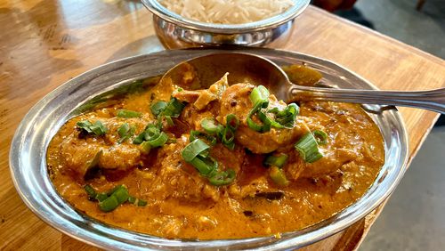 The Goan prawns masala at Chai Pani come coated in a deeply flavorful sauce tinged with chile heat. Angela Hansberger for The Atlanta Journal-Constitution