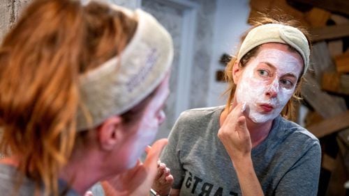 Amy Leavell Bransford applies her DIY yogurt facial mask at her Atlanta salon June 30, 2020. STEVE SCHAEFER FOR THE ATLANTA JOURNAL-CONSTITUTION