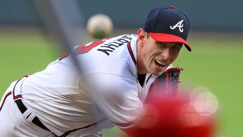 Atlanta Braves pitcher Brandon McCarthy delivers a pitch against Phillies Scott Kingery Wednesday, April 18, 2018, in Atlanta.