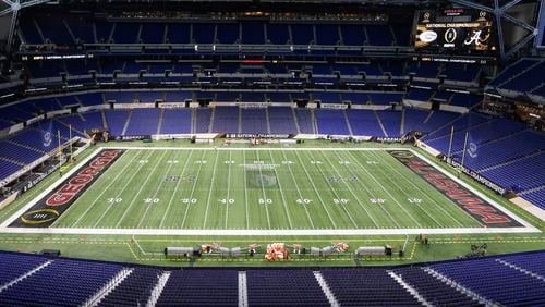 1/9/22 - Indianapolis - Except for the center logo, the field appears to be ready at the scene of the 2022 College Football Playoff National Championship  between the Georgia Bulldogs and the Alabama Crimson Tide at Lucas Oil Stadium in Indianapolis on Sunday, January 9, 2022.   Bob Andres / robert.andres@ajc.com