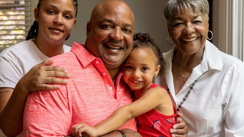 Alexis Scott (from left) with her father Rufus, sister Stella (age 5) and grandmother Essie. Rufus Scott is a heart transplant recipient who has reached out to his donor family.  PHIL SKINNER FOR THE ATLANTA JOURNAL-CONSTITUTION.