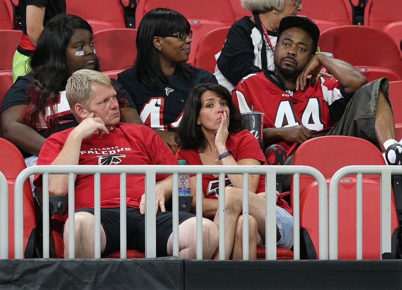 September 23, 2018 Atlanta: Atlanta Falcons fans sit dejected in the stands after falling 43-37 to the New Orleans Saints during overtime in an NFL football game on Sunday, Sept 23, 2018, in Atlanta. CURTIS COMPTON/CCOMPTON@AJC.COM