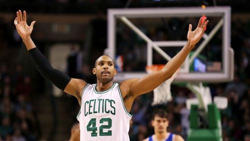 Al Horford of the Boston Celtics reacts during the third quarter against the Philadelphia 76ers at TD Garden on January 6, 2017 in Boston, Massachusetts. The Celtics defeat the 76ers 110-106. (Photo by Maddie Meyer/Getty Images)