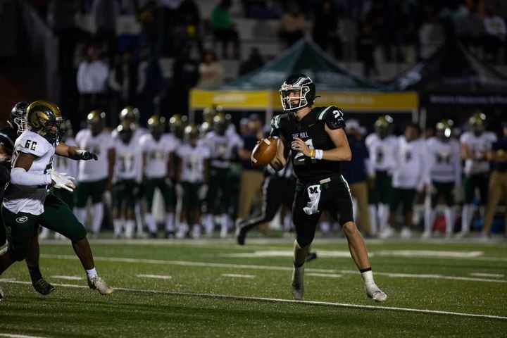 Collins Hill quarterback Sam Horn (21) carries the ball during a GHSA high school football game between the Collins Hill Eagles and the Grayson Rams at Collins Hill High in Suwanee, GA., on Friday, December 3, 2021. (Photo/ Jenn Finch)