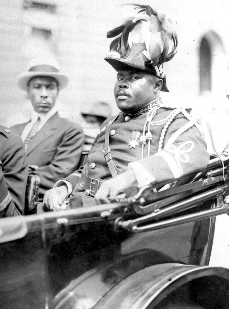 Marcus Garvey was fond of ceremonial garb, and wore this Prussian-inspired uniform during a 1922 parade through Harlem. By this time he had announced his new self-appointed title, “Provisional President of Africa.” (AP Photo)