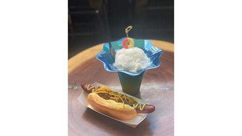 The Cream Peach, based on one of Little Spirit’s best-selling cocktails the King Peach, is made with bourbon, Aperol, lemon, mint, allspice dram, sugar and condensed milk, with Little Spirit's chili dog. / Photo courtesy of Little Spirit