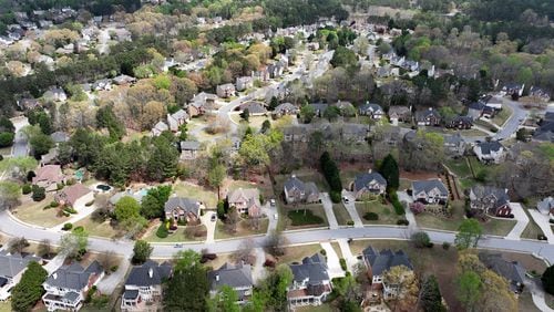 Aerial photograph shows the Hamilton Mill subdivision, a 2,200 home community nestled in the hills of Northeast Gwinnett County, Tuesday, April 2, 2024, in Dacula. (Hyosub Shin / Hyosub.Shin@ajc.com)