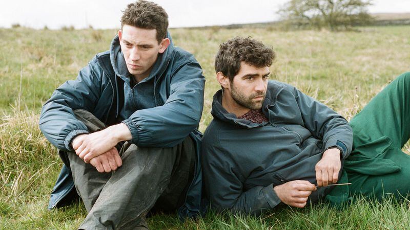 A young farmer (Josh O Connor, left) in the Yorkshire countryside enters a life-changing relationship with a Romanian hired hand (Alec Secareanu) in the drama “God’s Own Country,” screening at the Out on Film festival at 7:05 p.m. Sept. 30 at Landmark Midtown Art Cinema. CONTRIBUTED BY OUT ON FILM
