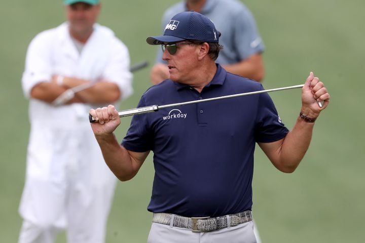 April 8, 2021, Augusta: Phil Mickelson reacts to missing a birdie putt his on the tenth hole during the first round of the Masters at Augusta National Golf Club on Thursday, April 8, 2021, in Augusta. Curtis Compton/ccompton@ajc.com