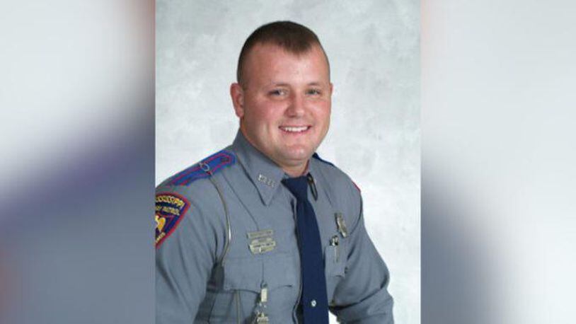 Off-duty Trooper Kenneth Joshlin "Josh" Smith, 32, from Walnut, Mississippi, was shot and killed early Sunday, authorities said.