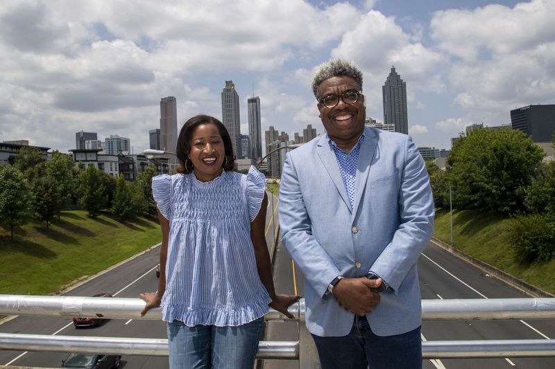 AJC reporter Ernie Suggs and columnist Nedra Rhone pose for a portrait in Atlanta, Wednesday, August 4, 2021.  (Alyssa Pointer/Atlanta Journal Constitution)