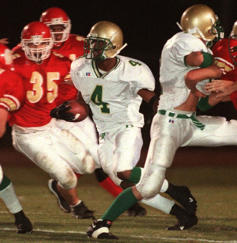 Wide receiver P.K. Sam wore No. 4 with Buford High School before going on to Florida State and then the NFL. Sam now suffers the debilitating effects of repeated head injuries and is out of the sport. BOBBY ABRAHAMSON / SPECIAL