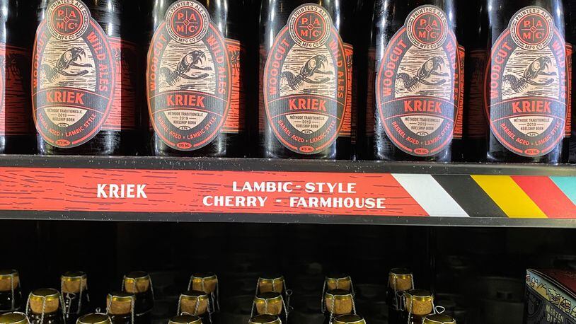 Printer’s Ale Kriek is spontaneously fermented, transferred into wine barrels, and aged on cherries for over a year before bottling. (Bob Townsend for The Atlanta Journal Constitution)