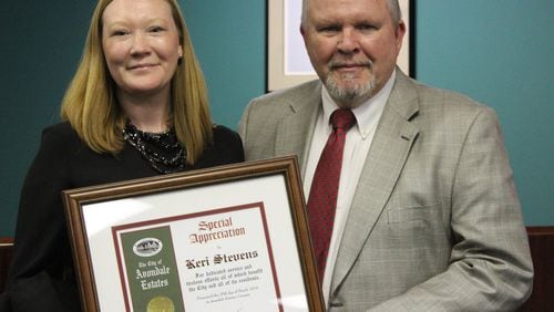 City Planner Keri Stevens was recognized as the city’s Employee of the Year in 2018. She is shown here with former Finance Director and Interim City Manager Ken Turner. Stevens, the first and only city planner in Avondale history, is leaving for a job in Gwinnett County. Courtesy City of Avondale Estates