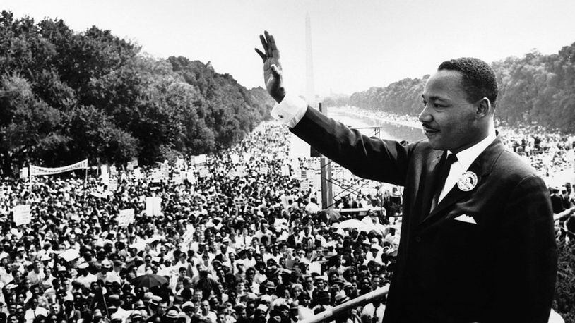 Martin Luther King, Jr. waves from the steps of the Lincoln Memorial during the Aug. 28, 1963 March on Washington.