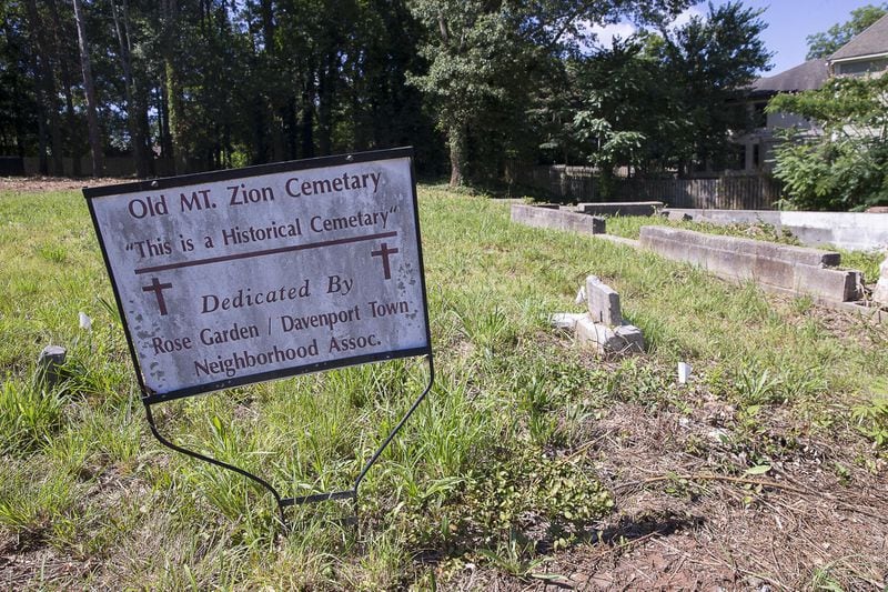 A sign at the entrance identifies the Old Mt. Zion cemetery in Smyrna, Friday, June 21, 2019. ALYSSA POINTER/ALYSSA.POINTER@AJC.COM