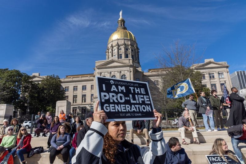 Saturday will mark one year since the U.S. Supreme Court overturned Roe v. Wade, paving the way for new laws in conservative states limiting access to abortion. Pictured are participants in the March for Life rally in Atlanta in January. (Arvin Temkar/The Atlanta Journal-Constitution)