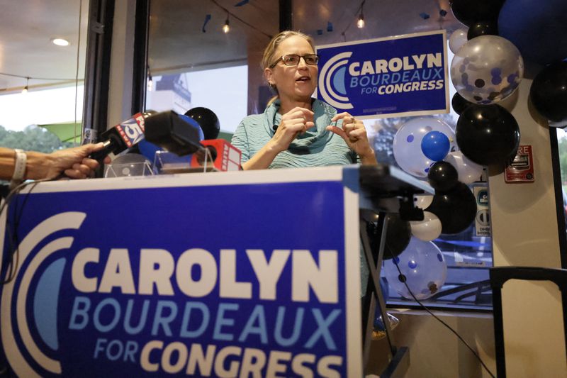 Former U.S. Rep. Carolyn Bourdeaux said the state's congressional districts should reflect the overall electorate, which gave Democrat Joe Biden 49.5% of the vote to 49.2% for Republican Donald Trump. “The state is a 50/50 state," Bourdeaux said, "so it should be roughly represented by seven Democrats and seven Republicans, and the districts should be drawn to produce results that are in keeping with the actual views of the population.” Miguel Martinez / miguel.martinezjimenez@ajc.com