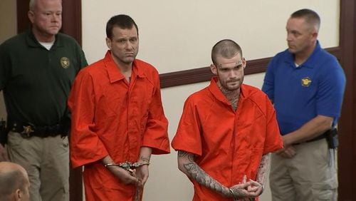 Donnie Rowe (left) and Ricky Dubose enter a court appearance in Putnam County. (AJC file)