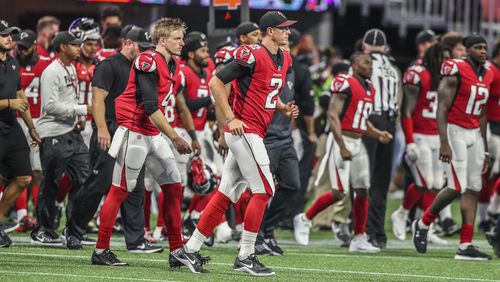 August 26, 2017 Atlanta: Atlanta Falcons quarterback Matt Ryan (2) runs off the field following the loss to the Cardinalson Saturday, Aug. 26, 2017 at the opening of the brand new Mercedes Benz Stadium and pre-season NFL game between the Atlanta Falcons and the Arizona Cardinals. JOHN SPINK/JSPINK@AJC.COM