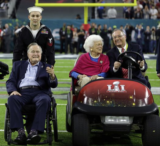 President George H.W. Bush flips coin at Super Bowl