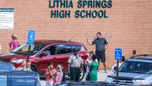 Classes were canceled Thursday at Lithia Springs High School after a veteran teacher shot himself inside his classroom. JOHN SPINK / JSPINK@AJC.COM