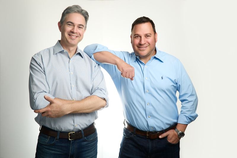 Russ Law, left, and Yariv Lis co-founded Verensics, an Atlanta-based company whose software helps companies weed out potential unethical or illegal behaviors by their employees before they happen, taking corporate security beyond the routine background checks.