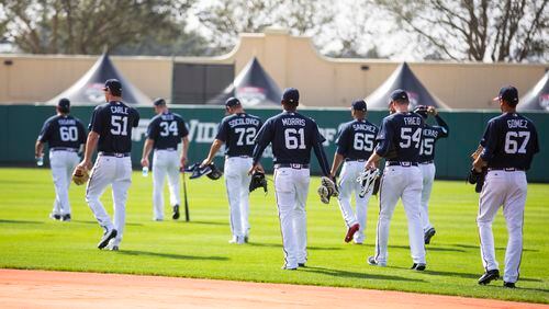 Hi-ho, hi-ho, it's off to work the Braves pitchers and catchers go Wednesday, the first day of spring training. (AP Photo/Willie J. Allen Jr.)