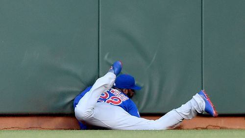 Jason Heyward of the Cubs slams into the wall while robbing the Giants' Denard Span of a hit in San Francisco Friday night. Heyward had to leave the game but was not injured seriously. (Photo by Thearon W. Henderson/Getty Images)