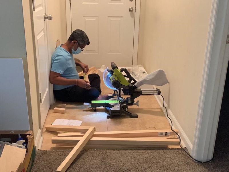 Anil Joseph launched into a new hobby — woodworking — during the COVID-19 pandemic. His primary workspace is the tiny atrium by the front door of his family's rented home in Marietta. (SPECIAL)