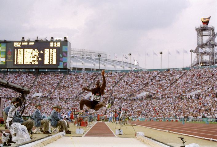 Carl Lewis wins the long jump
