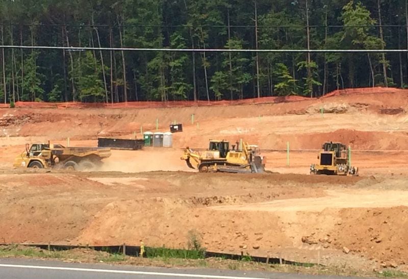 Another patch of land in Suwanee where “a master-planned community” will rise.