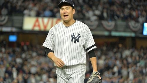 New York Yankees starting pitcher Masahiro Tanaka worked seven shutout inning against the Houston Astros in Game 5 of the American League Championship Series at Yankee Stadium in New York on Wednesday, Oct. 18, 2017. Tanaka has to decide by three days after the conclusion of the World Series whether to opt out of the final three years and $67 million of his contract. (Howard Simmons/New York Daily News/TNS)