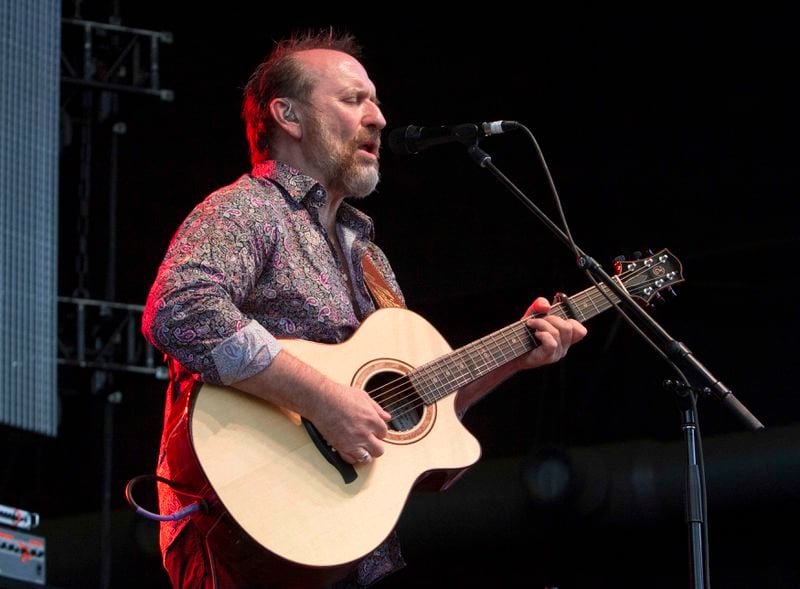 Colin Hay of Men at Work performs during the Last Summer on Earth Tour 2015 at Verizon Wireless Amphitheatre on Sunday, July 12, 2015, in Atlanta. He's back in town on Sept. 19 with Ringo Starr's All Starr Band. (Photo by Robb D. Cohen/Invision/AP)