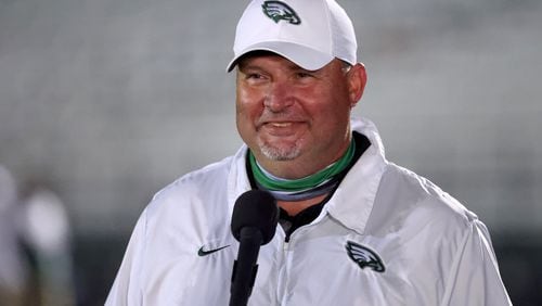 Oct. 30, 2020 - Suwanee, Ga: Collins Hill coach Lenny Gregory is interviewed after their 42-21 win over North Gwinnett at Collins Hill high school Friday, October 30, 2020 in Suwanee, Ga.. JASON GETZ FOR THE ATLANTA JOURNAL-CONSTITUTIONa



