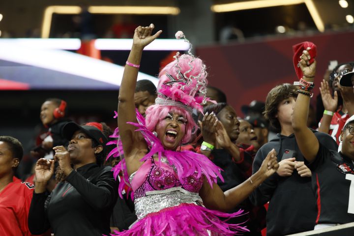 A Falcons fan reacts at the end of the regulation. The Falcons defeated the Panthers 37-34 in overtime Sunday.
 (Miguel Martinez / miguel.martinezjimenez@ajc.com)
 